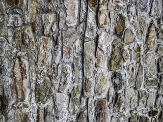 Photo of textured brown sandstones. Stock background with an old castle.