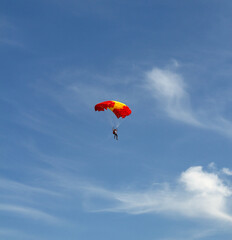 colorful parachute in the blue sky