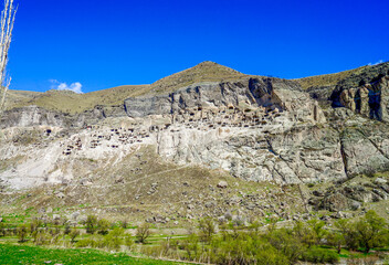 Georgia, The monumental cave city of Vardzia. Seen from outside down the valley.