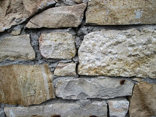 Strong sandstone masonry. The frozen wall of a fortified building.