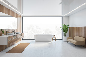 Wooden and white bathroom with white bathtub, sofa and window