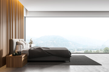 Master bedroom with grey wooden walls, panoramic window with countryside view, comfortable king...