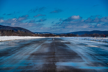 Airport Runway landscape with snow and mountains