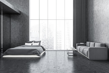 Grey bedroom, bed with linens and sofa on marble floor near window