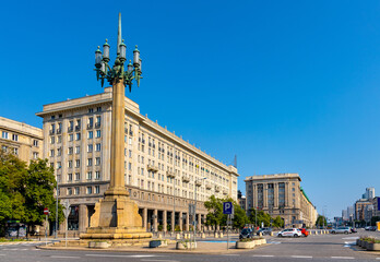 Panoramic view of  Plac Konstytucji Constitution square with communist architecture of MDM quarter in Srodmiescie downtown district of Warsaw, Poland - obrazy, fototapety, plakaty