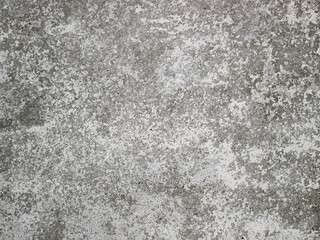 Concrete surface with rough old paint. Light grainy surface.