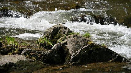 water flowing over rocks