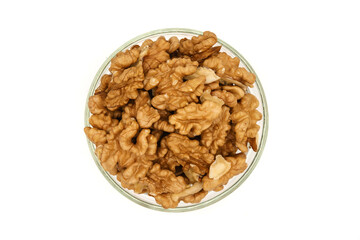 peeled walnuts in a bowl on a white background