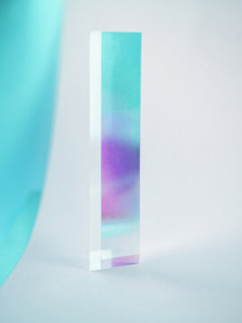 reflecting prism with pastel colors background