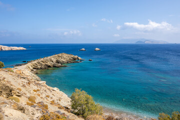 Fototapeta na wymiar Latinaki beach, rocky beach with crystal waters on Folegandros island. Cyclades, Greece