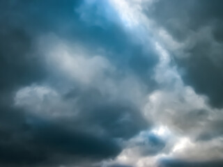 Obraz premium Gloomy gray-blue sky. Rainy weather in spring.