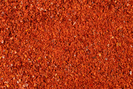 chilli pepper seedless flakes background. Spices and food ingredients. In Korea known as Gochugaru. Used for Kimchi.