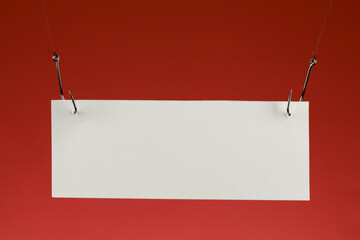 blank piece of paper on a fishhook