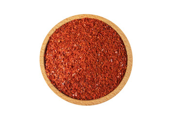 Obraz na płótnie Canvas chilli pepper seedless flakes in wooden bowl isolated on white background. Spices and food ingredients. in Korea known as Gochugaru. Used for Kimchi.