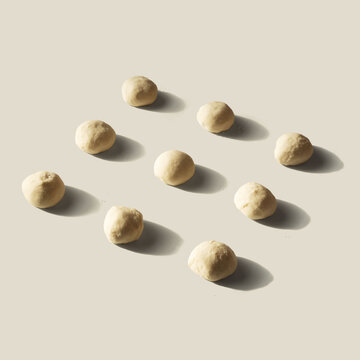 Doughs of Hotteok on isolated background. Sometimes called Hoeddeok, is a type of filled Korean pancake. It is a snack from Korean Chinese cuisine and is a popular street food in South Korea.