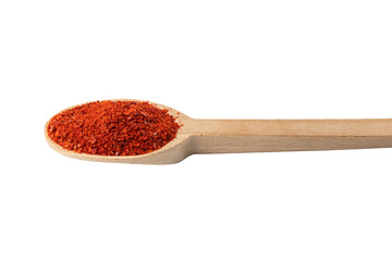 chilli pepper seedless flakes  in wooden spoon isolated on white background. Spices and food ingredients. in Korea known as Gochugaru. Used for Kimchi.