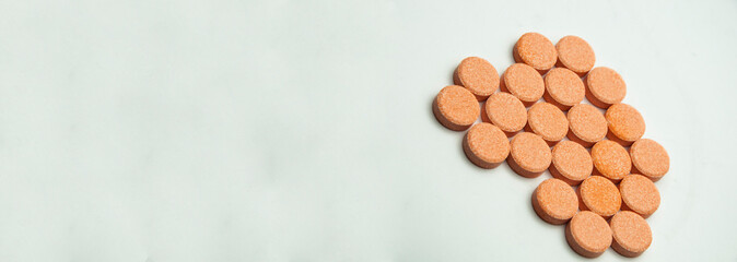 pills on a gray background. medicinal capsules on the table. treatment concept. many vitamins