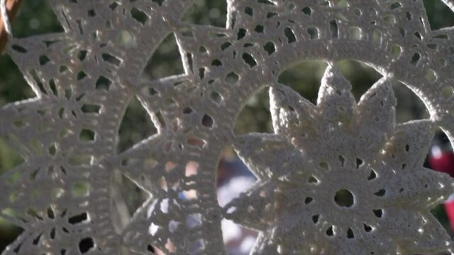 closeup of dreamcatcher crocheted with ecru yarn with selected focus cordoba argentina