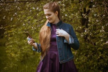 A girl takes a selfie on her phone