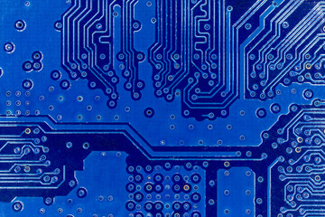 close up of blue electronics circuit board