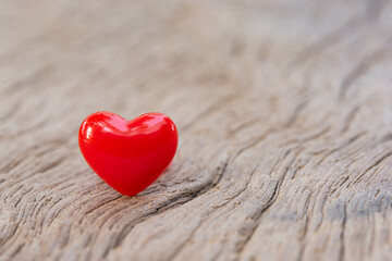 Fototapeta premium Valentines Day background with red hearts on plank wooden, copy space..