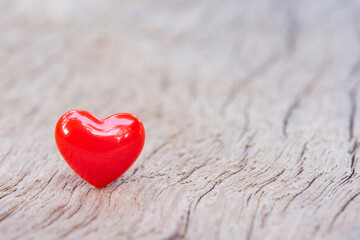 Fototapeta premium Valentines Day background with red hearts on plank wooden, copy space..