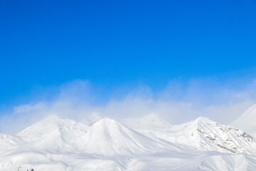 Obraz premium Snowy mountains landscape in Gudauri, Georgia