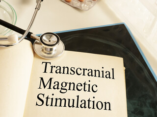 Transcranial Magnetic Stimulation TMS is shown on the photo using the text