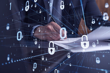 A businessman in formal wear signing the contract to prevent probability of risks in cyber...