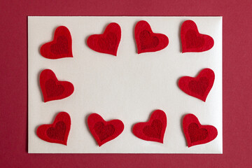 Red hearts on white and red paper