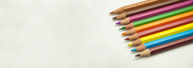 colored pencils on a white background. education concept. illustration of training.