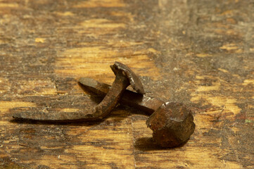Bent forged nails