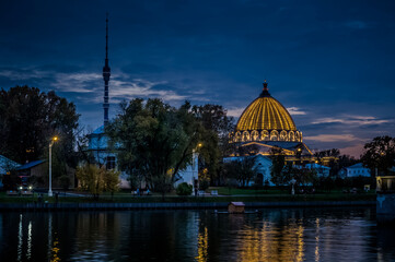 Pavilion of the Museum of Cosmonautics at VDNKH. Night landscape of Pavilion No. 32 Cosmos and Ostankino television tower © Konstantin