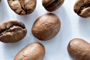 Close-up shot of coffee beans on the table.