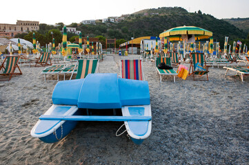 The last people enjoying the lido in the evening.  Marina di Camerota. Italy.