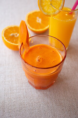 Glass with fresh carrot juice