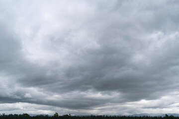 Fototapeta na wymiar clouds over the field