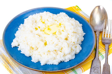 Delicious rice milk porridge in blue plate on white background
