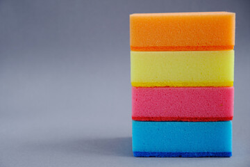 Cleaning sponges for washing dishes and various surfaces