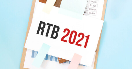 Paper plate with text take RTB 2021. Diagram, notepad and blue background