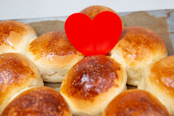 heart for valentine's day with delicious buns background