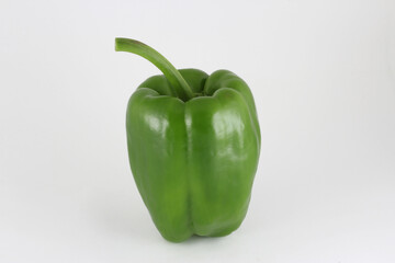 green bell pepper on white