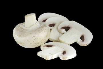 cutted champignons on a black background