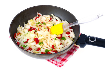 Frying pan with chopped cabbage, vegetable dishes