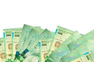 2000 Kazakhstani tenge bills lies on bottom side of screen isolated on white background with copy...