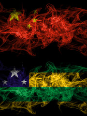 China, Chinese vs Brazil, Brazilian, Sergipe smoky mystic flags placed side by side. Thick colored silky abstract smoke flags.