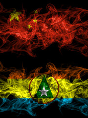 China, Chinese vs Cabinda smoky mystic flags placed side by side. Thick colored silky abstract smoke flags.