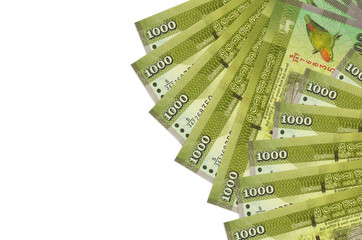 1000 Sri Lankan rupees bills lies isolated on white background with copy space. Rich life...