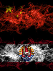 China, Chinese vs France, French Polynesia smoky mystic flags placed side by side. Thick colored silky abstract smoke flags.