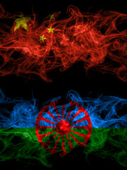 China, Chinese vs Gipsy smoky mystic flags placed side by side. Thick colored silky abstract smoke flags.